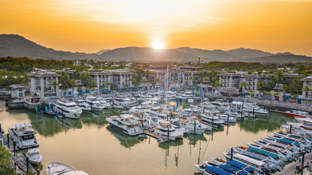 Yachts moored at sunset during the yacht show at Royal Phuket Marina