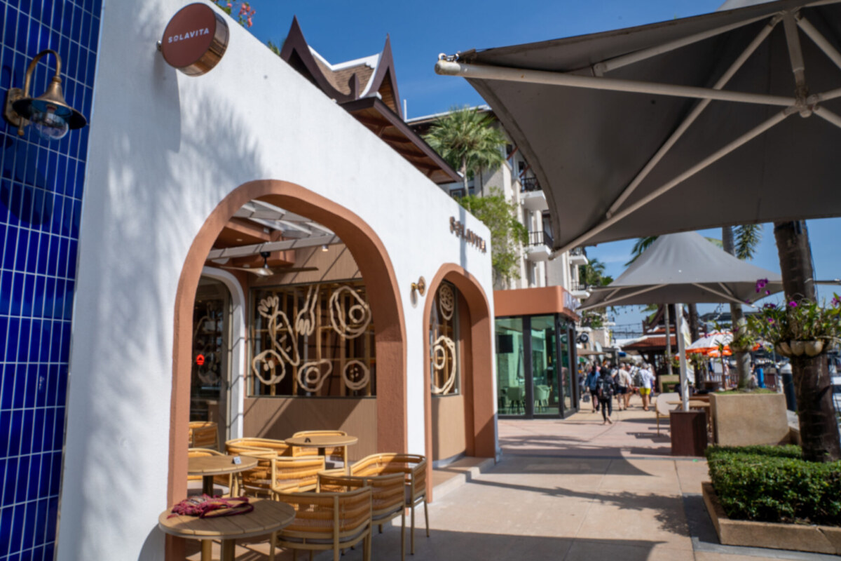 Light-filled interior at SOLAVITA cafe, Royal Phuket Marina